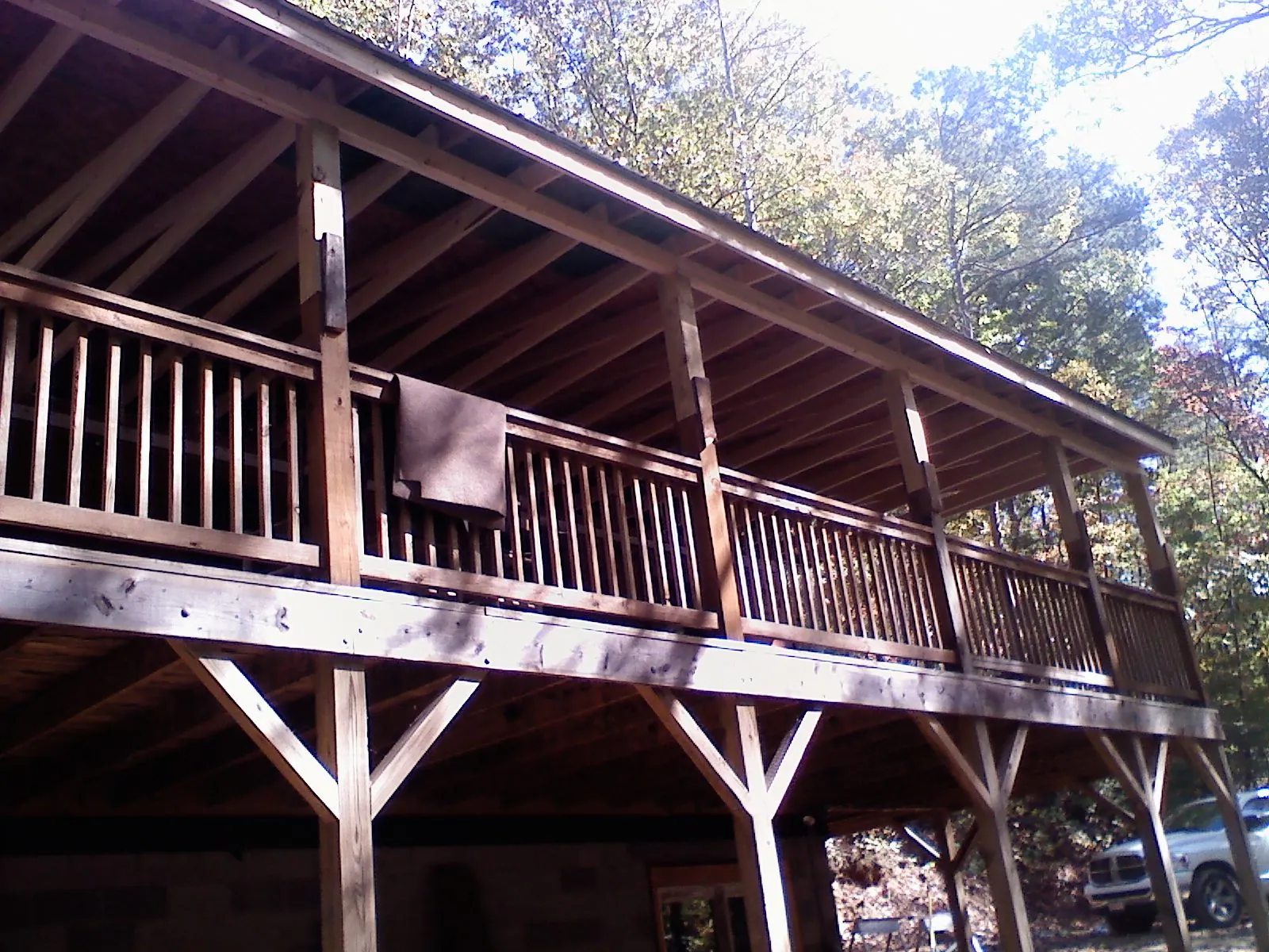 Timber framing under a new elevated porch and deck — Roof Leak Repair in Mumford by Roofing Brothers